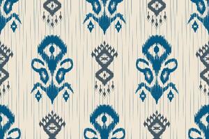 Seamless blue and grey ikat fabric pattern. Traditional ethnic ornament for fabric and textiles. Abstract geometric and floral patterns in vertical style for home decor and fashion. vector