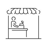 A man is standing at a counter with a sign that says cashier vector