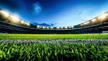 A large empty football pitch with grass at the stadium, with bright lighting masts and a blue sky with clouds overhead video