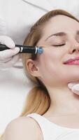 A professional cosmetologist performs hydropiling on a client, providing advanced skin care treatments. Perfect for promoting luxurious beauty services and enhancing your brand image video