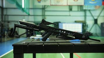 Tactical Crossbows Displayed on Table in Archery Range video