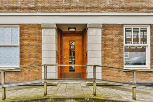 A building with a door and a railing photo