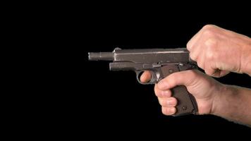 Male hands presenting weapons a gun. Alpha channel. Simulation of reloading weapons and shooting a pistol on a transparent background video
