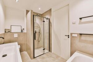 A bathroom with a shower and a sink photo