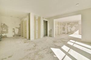 An empty room with drywall and paint on the walls photo