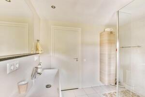 A bathroom with a shower and a sink photo