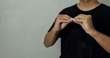 young man using sign language interpreter to communicate photo