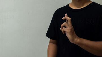 young man using sign language interpreter to communicate photo