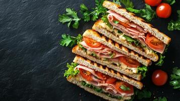 Grilled sandwich with fresh vegetables and melty cheese on a wooden cutting board photo