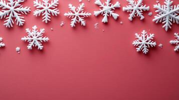 Decorative white snowflakes scattered on a pink background for festive winter decor ideas photo