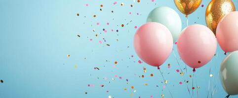 Colorful balloons and confetti filling the air at a festive celebration with a blue background photo