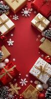 Wrapped Christmas gifts arranged on a festive black background with ornaments photo