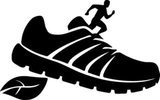 A silhouette of a running shoe with a leaf vector