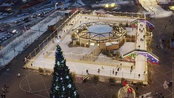 Central square of Vladivostok with a skating rink and ice slides. Downtown video