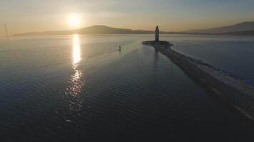 Drone view on Tokarev cat on the background of the sea landscape. video