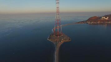 Drone view on Tokarev cat on the background of the sea landscape. video
