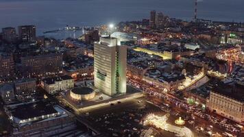 Central square of Vladivostok with a skating rink and ice slides. Downtown video
