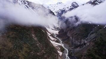 Aerial. beautiful gorge on the slopes of Mount Elbrus with a beautiful waterfall video