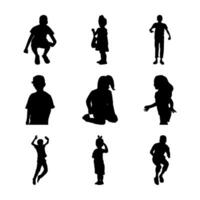 Silhouettes of children in various poses vector