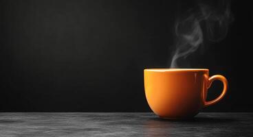 Steaming cup of coffee on a dark surface with a warm atmosphere in a cozy setting photo