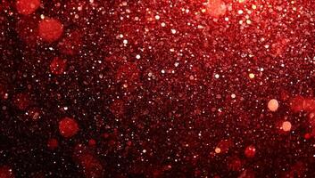 Vibrant red glittering particles shimmering in a sparkling background during a festive celebration photo