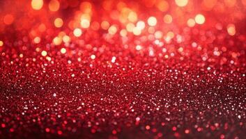 Vibrant red glittering particles shimmering in a sparkling background during a festive celebration photo