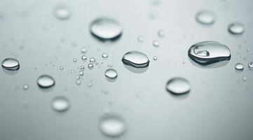 Close-up of raindrops on a glass surface during a rainy afternoon in a quiet urban setting photo