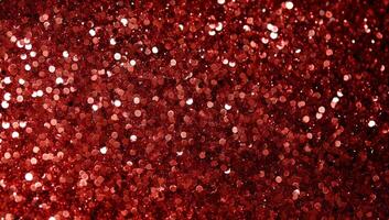 Vibrant red glittering particles shimmering in a sparkling background during a festive celebration photo