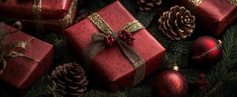 Festively wrapped red Christmas gifts arranged among pine branches and holiday decorations photo