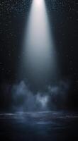 Radiant beams of light shining through a dark space with floating particles in the air photo