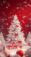 Snowy Christmas tree with red bows and gifts in a winter wonderland photo