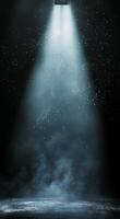 Radiant beams of light shining through a dark space with floating particles in the air photo