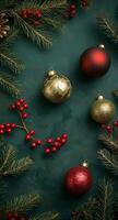 Festive holiday decor with ornaments and greenery on a dark green background photo