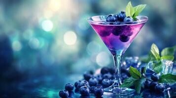 Refreshing berry cocktail garnished with mint and blueberries on a colorful blurred background photo