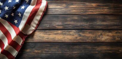 American flag draped over rustic wooden surface in a calm, patriotic setting photo