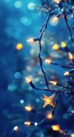 Twinkling star decoration with fairy lights on a sparkling blue background in a cozy setting photo