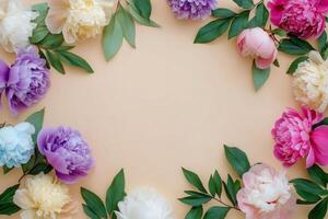 Colorful peonies and leaves arranged in a circular frame on a soft background photo