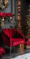 Cozy red chair in a festive room decorated with a Christmas tree and poinsettias photo