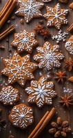 Deliciously decorated snowflake cookies arranged on a rustic wooden table photo