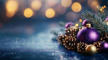 Purple ornaments and pinecones on a snowy surface with a blurred festive background photo