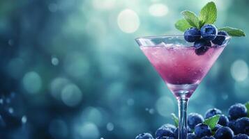 Refreshing berry cocktail garnished with mint and blueberries on a colorful blurred background photo