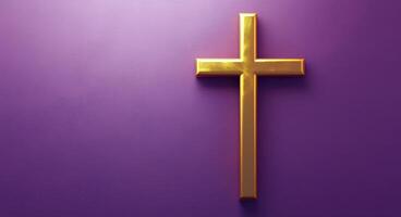 A golden cross set against a smooth purple background for religious symbolism and decoration photo