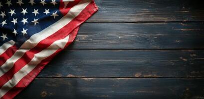 American flag draped on rustic wooden table background during a quiet moment of reflection photo