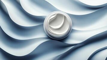 Cream container on soft blue waves showcasing skincare product elegance in bright lighting photo