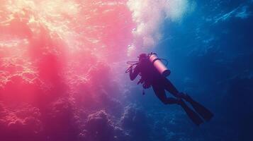 Diver exploring the serene underwater world with scuba gear in bright blue waters photo