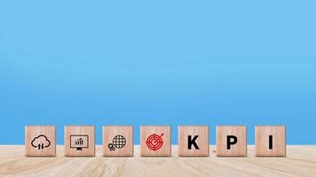 KPI text in wooden cube, Key Performance Indicator concept, Management data System KPI connected database follow earnings, Financial business data analytics graph dashboard. photo
