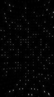 LED lights background with a grid of twinkling bright white lights. Blinking stage lights animation. This minimalist vertical background is full HD and looping. video