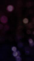 Colorful flashing LED lights party background. Glowing disco wall animation. Full HD and looping multicolored glittering LEDs vertical motion background. video