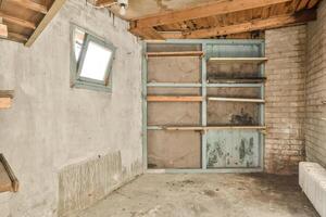 A room with a ladder and a shelf in it photo