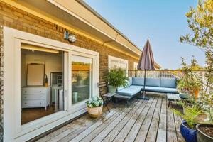 A patio with a table and chairs on it photo